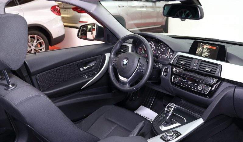 BMW 320d Touring lleno