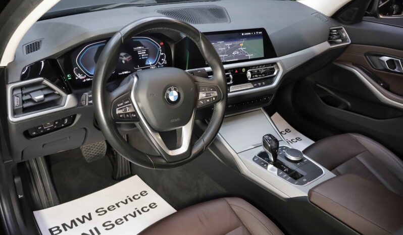 BMW 330e lleno