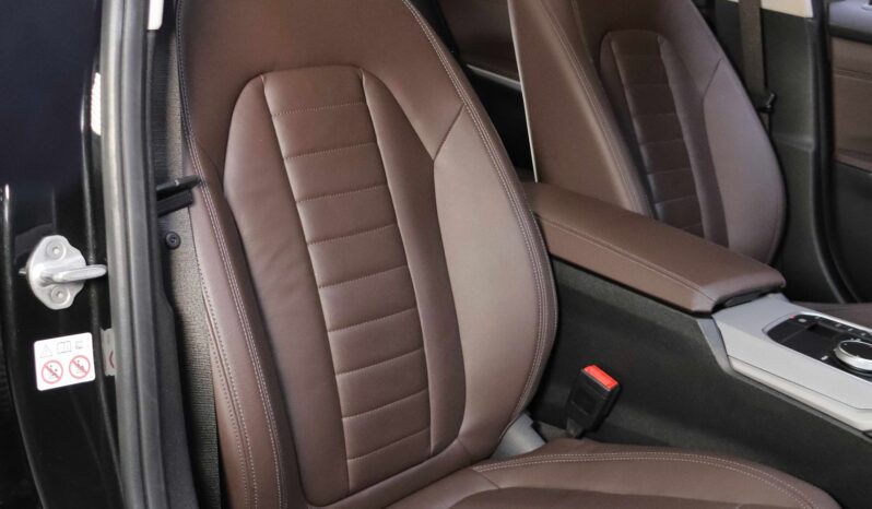 BMW 330e lleno