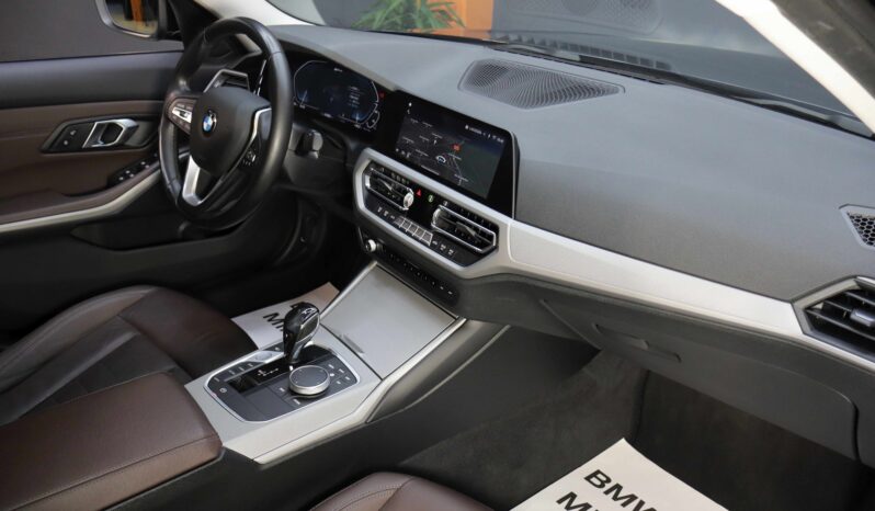 BMW 330e lleno