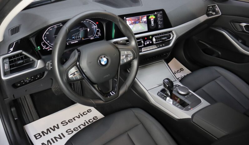 BMW 330e lleno