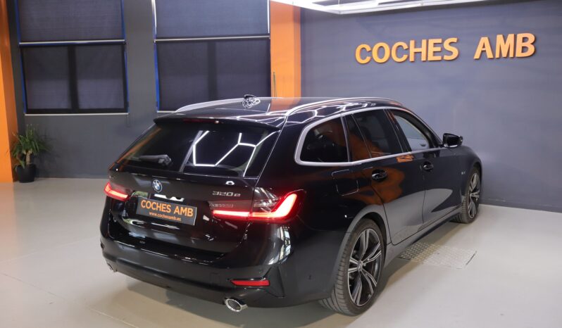BMW 320e xDrive Touring lleno