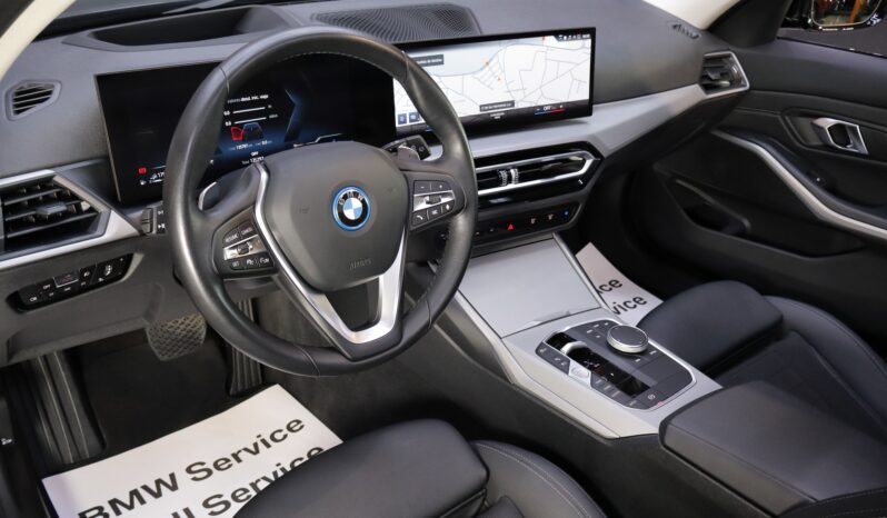 BMW 320e Touring lleno