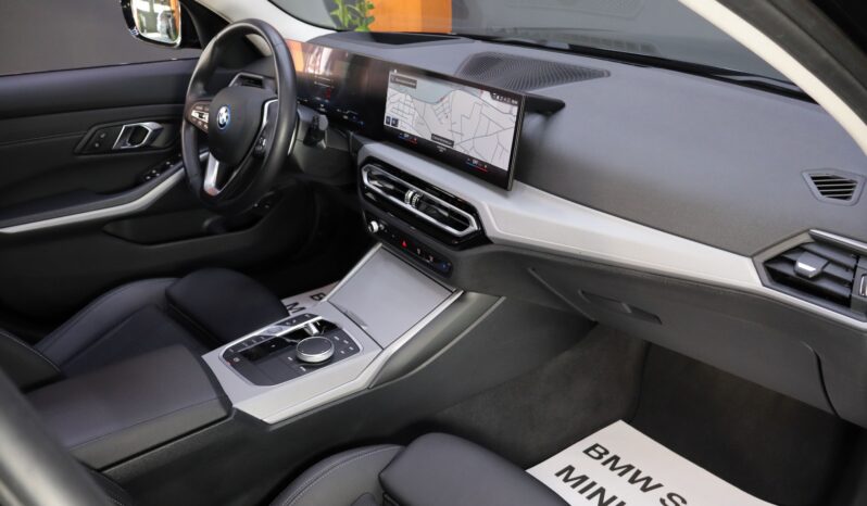 BMW 320e Touring lleno