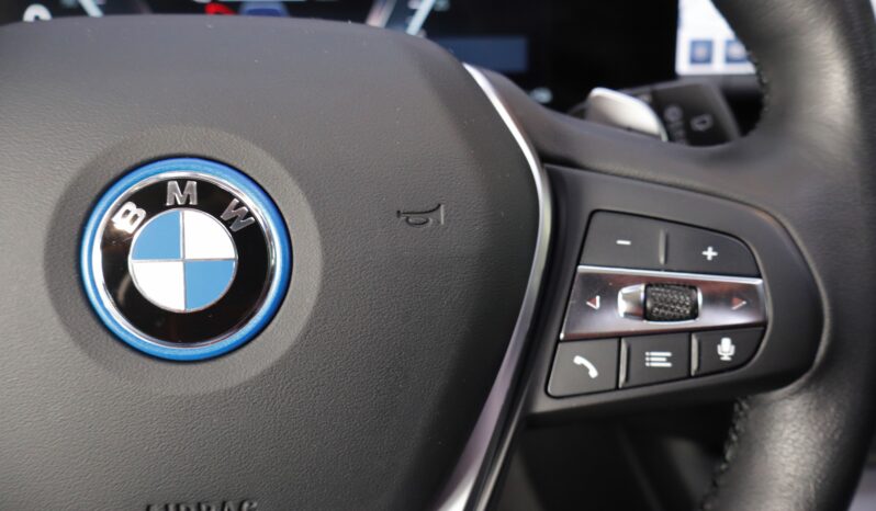 BMW 320e Touring lleno