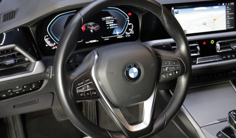 BMW 330e lleno