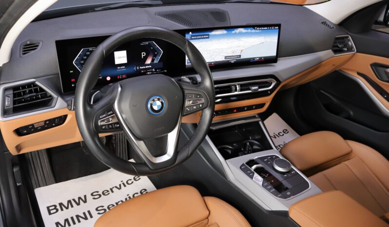 BMW 320e Touring lleno