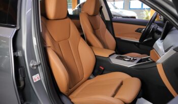 BMW 320e Touring lleno