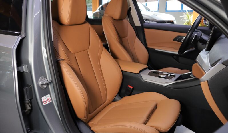 BMW 320e Touring lleno