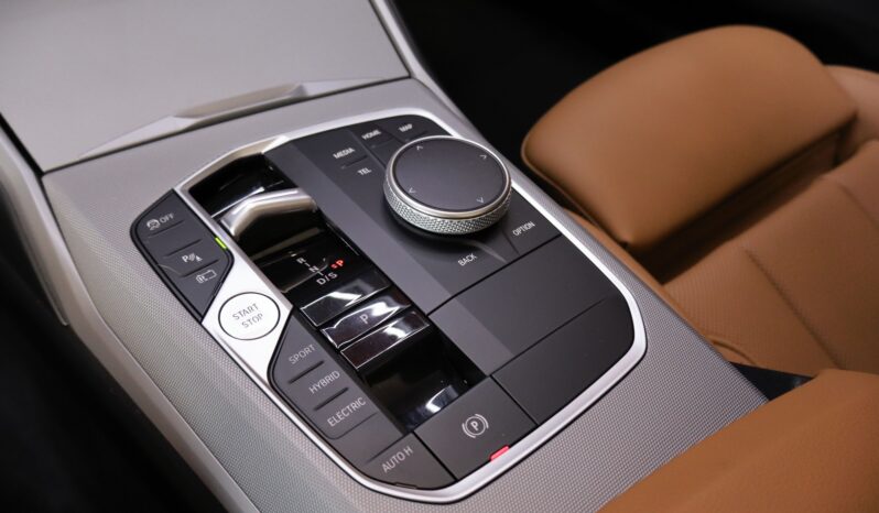 BMW 320e Touring lleno