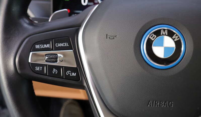 BMW 320e Touring lleno